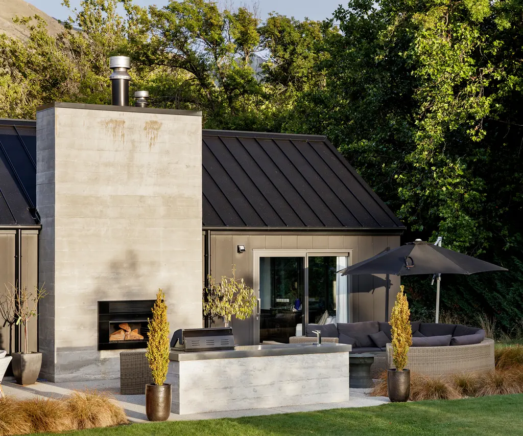 Alpine garden with outdoor fireplace