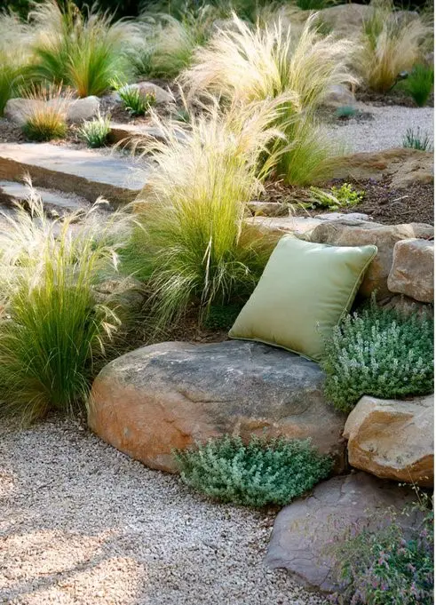Rock garden with a natural chair