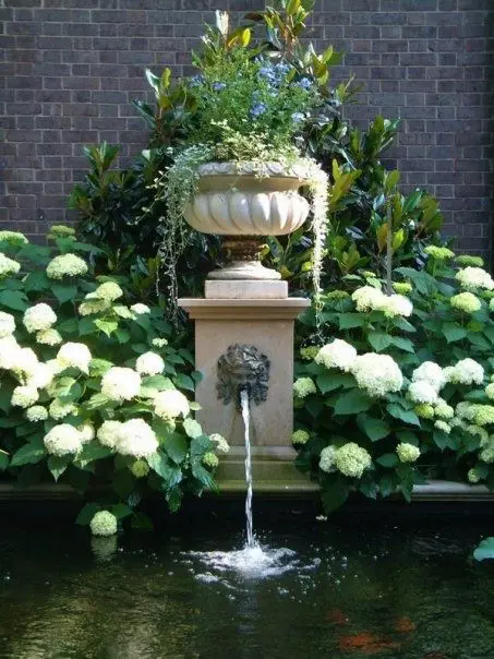 Water feature with hydrangeas