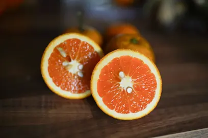 A 'Cipo' Orange fruit cut in half.